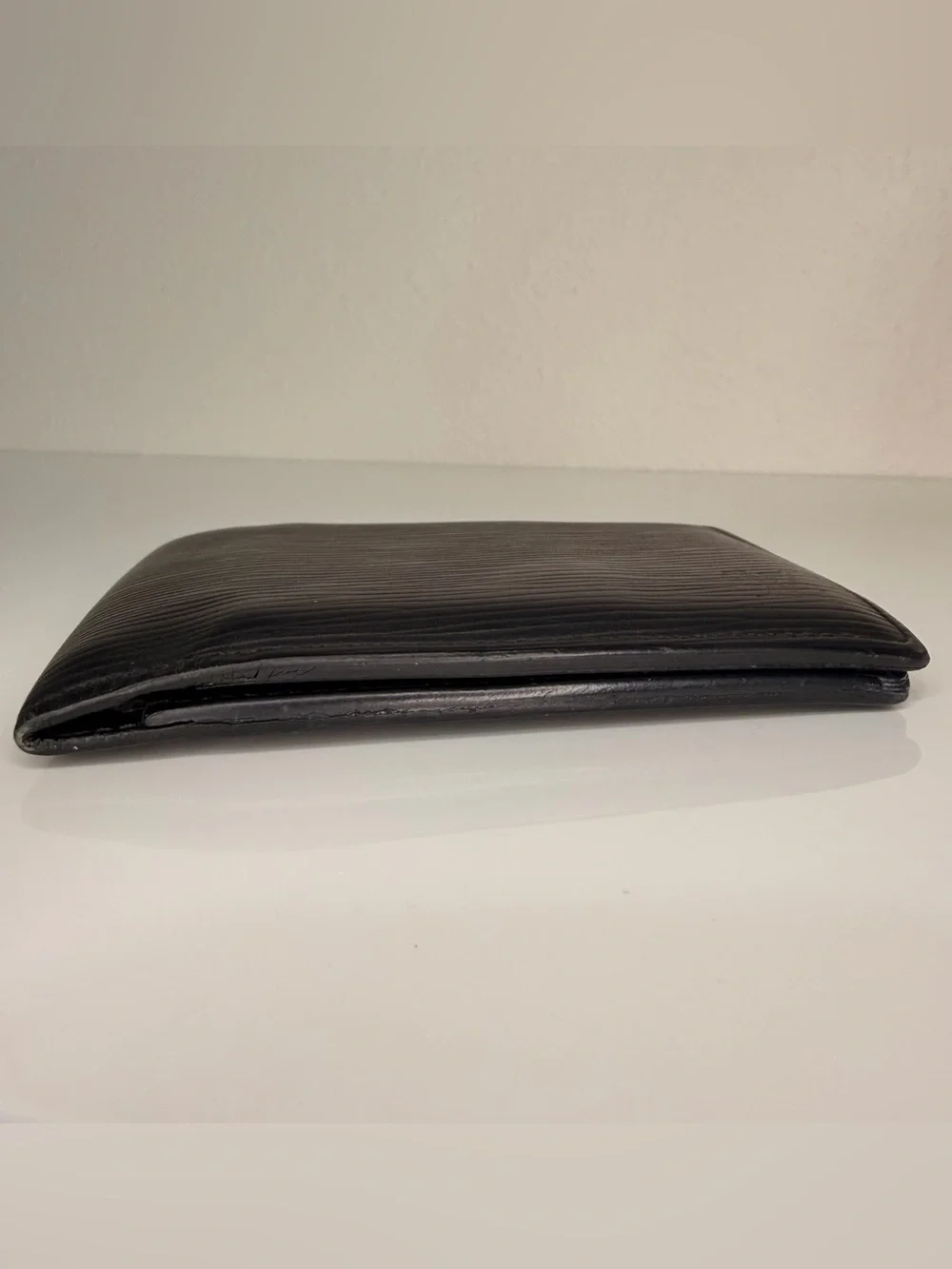 Authentic Louis Vuitton Black Epi Leather Bi-Fold Wallet